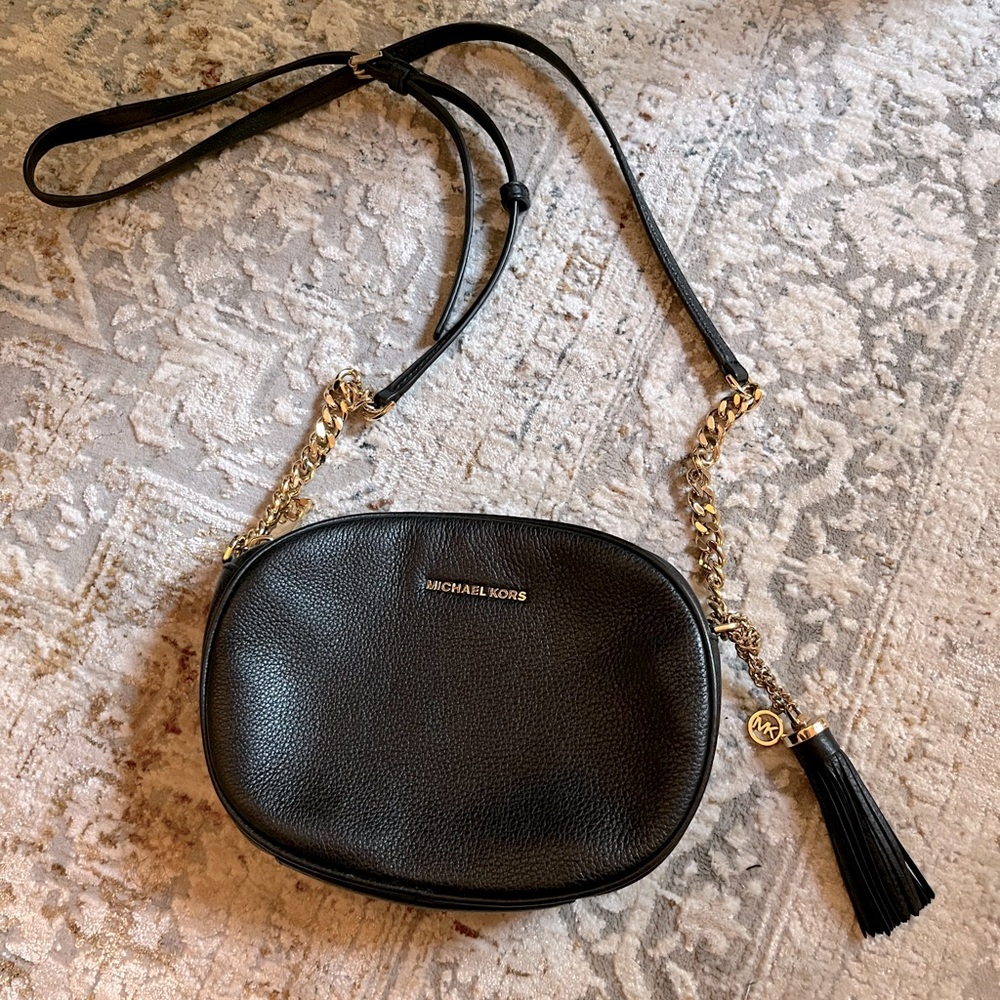 Michael kors black cross body with gold accents called “The Ginny”